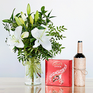 Gift set "Lilies, sweets and non-alcoholic wine" with delivery Vologda