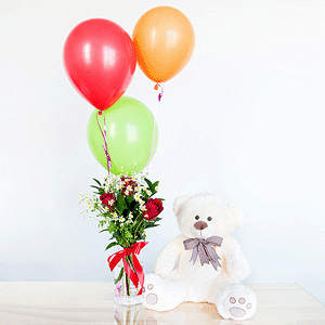 Red rose 50 cm - 7, Chamomile - 3, Aspidistra (1 pc.), Ruscus, Ribbon, Helium Balloon (1 pc.), Taddy Bear 45 cm
