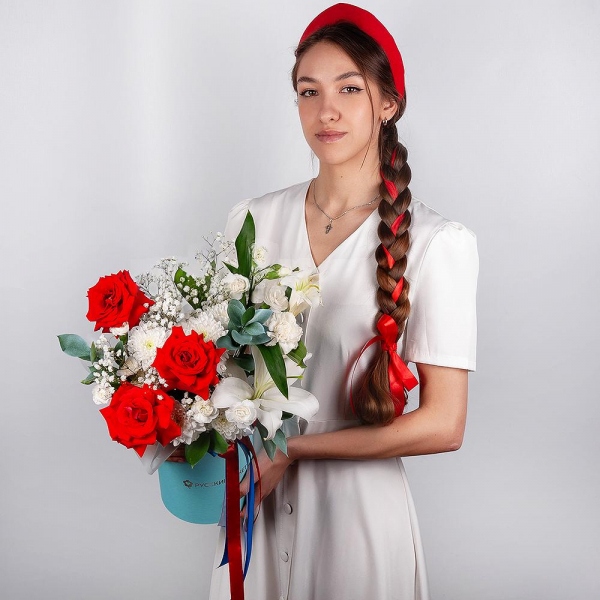 Red rose Nina 50 cm - 7, Gypsophila - 1, Baltica White Spray Chrysanthemum - 1, White spray carnation - 4, Carnation white, cream - 3, Lilies - 1, Round flower box medium, Oasis, Ruscus, Ribbon