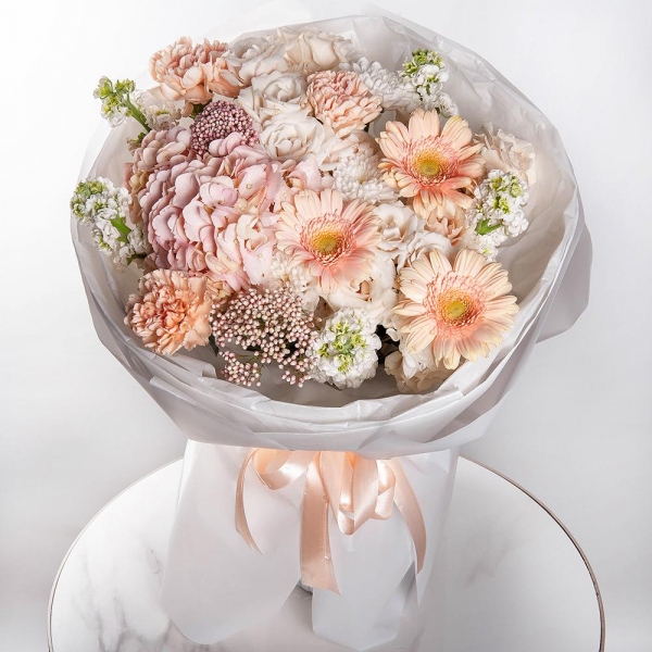 Pink Hydrangea - 1, Spray rose: white, cream, light pink 50 cm - 2, White Matthiola - 5, Cream gerbera - 5, Baltica White Spray Chrysanthemum - 2, Carnation white, cream - 5, Ozotamnus, Wrapping Paper