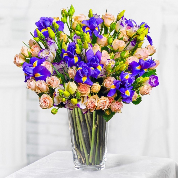 Spray rose: white, cream, light pink 50 cm - 9, Irises - 9, Purple Lisianthus (Eustoma) - 5, Mesh (Abaka), Ribbon