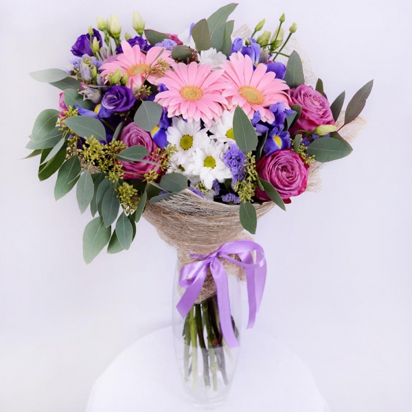 Moody Blue Rose - 10, Bacardi White Spray Chrysanthemum - 4, Purple Lisianthus (Eustoma) - 4, Gerbera pink - 4, Irises - 5, Blue Statice, Mesh (Abaka), Ribbon, Eucalyptus populus (1 pc.)
