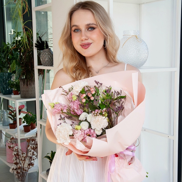 Carnation white, cream - 3, Newton White Spray Chrysanthemum - 1, Alstromeria white, soft pink - 1, Pink Lisianthus (Eustoma) - 2, Hypericum, Limonium (1 pc.), Waxflower (1 pc.), Wrapping Paper