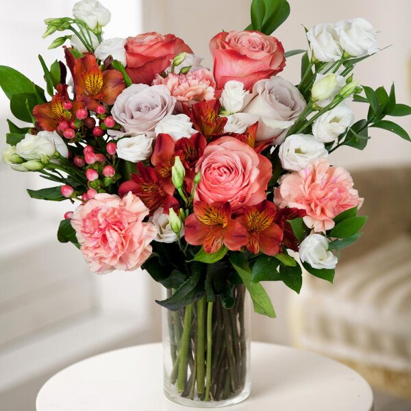 Peony rose Kahala 50 cm - 3, Pink rose 50 cm - 2, Pink carnation - 3, Alstromeria Red, Bright Pink - 2, lisianthus - 2, Ruscus, Hypericum, Wrapping Paper