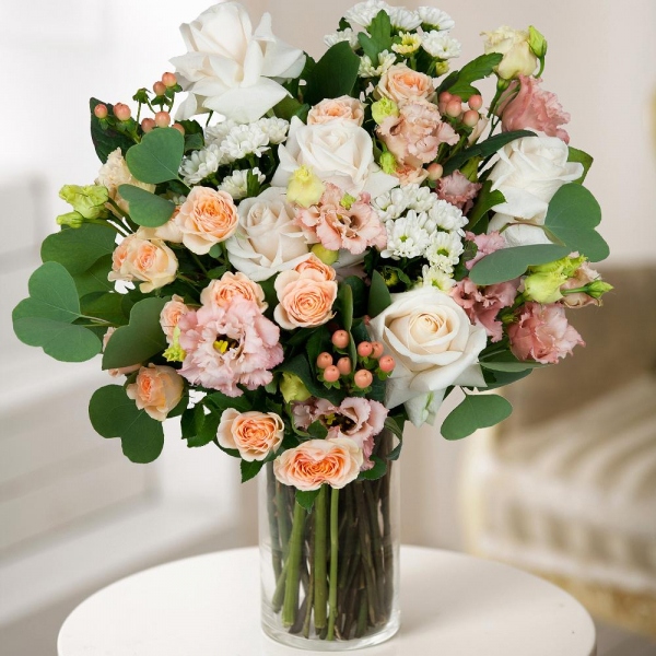 White rose 50 cm - 7, Spray rose: white, cream, light pink 50 cm - 4, Santini White Spray Chrysanthemum - 4, Pink Lisianthus (Eustoma) - 4, Hypericum, Wrapping Paper, Eucalyptus populus (1 pc.)