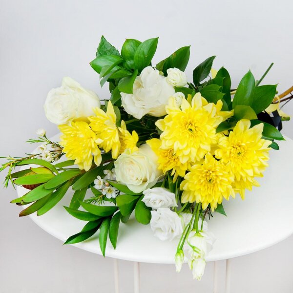 Baltica Yellow Spray Chrysanthemum - 2, White rose 50 cm - 3, lisianthus - 1, Leukodendron, Waxflower (1 pc.), Ruscus, Ribbon