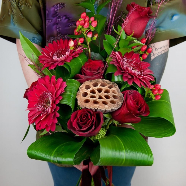 Red rose 50 cm - 5, Gerbera red - 3, Ruscus, Aspidistra (1 pc.), Hypericum, Skimmia, Dried flowers decor, Ribbon