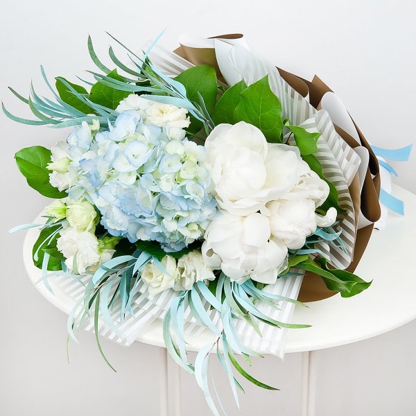 Blue/purple hydrangea - 3, Peony white - 5, lisianthus - 3, Eucalyptus, Salal, Wrapping Paper