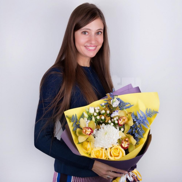 Magnum White Chrysanthemum - 1, Orchid bud yellow/brown Cymbidium - 3, Purple Lisianthus (Eustoma) - 3, Yellow rose 50 cm - 4, Flask for orchids, Hypericum, Solidago (1 pc.), Fern (1 pc.), Wrapping Paper