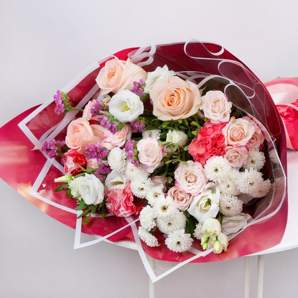 Athos poms Stallion - 3, Spray rose: white, cream, light pink 50 cm - 3, Rose Cream 50 cm - 3, Pink carnation - 3, lisianthus - 1, Pistachio, Wrapping Paper, Pink Statice