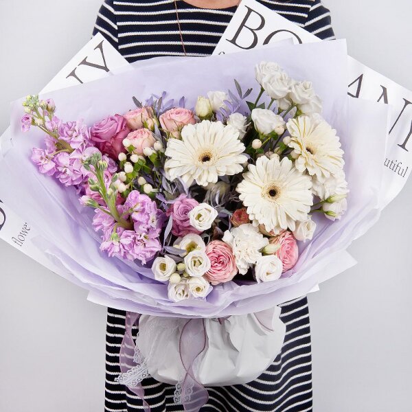 Gerbera white - 3, Pink rose 50 cm - 3, Peony sprayrose - 2, Carnation white, cream - 3, Matthiola Lilac - 2, lisianthus - 3, Hypericum, Pistachio, Wrapping Paper