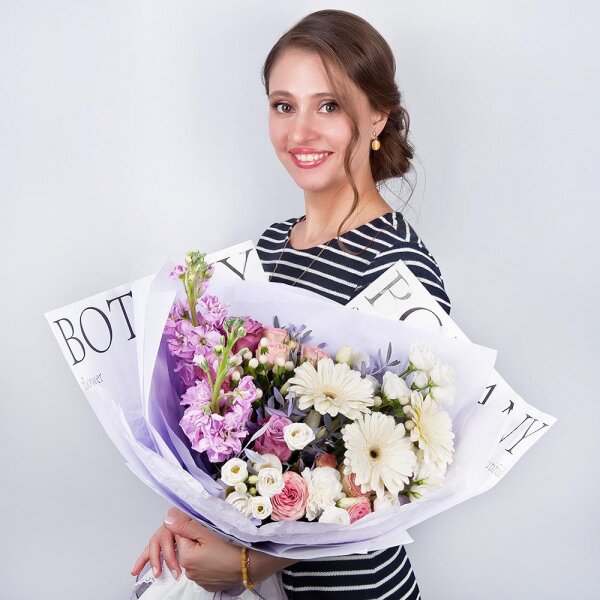 Gerbera white - 3, Pink rose 50 cm - 3, Peony sprayrose - 2, Carnation white, cream - 3, Matthiola Lilac - 2, lisianthus - 3, Hypericum, Pistachio, Wrapping Paper
