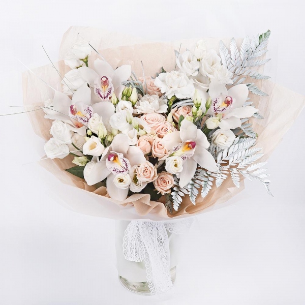 White Cymbidium Orchid Bud - 5, Spray rose: white, cream, light pink 50 cm - 6, Carnation white, cream - 4, lisianthus - 3, Flask for orchids, Fern (1 pc.), Beargrass (1 pc.), Wrapping Paper