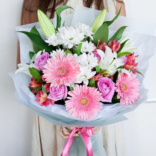 Lilies - 2, Alstromeria Red, Bright Pink - 2, Gerbera pink - 3, Pink rose 50 cm - 5, Bacardi White Spray Chrysanthemum - 2, Pistachio, Ruscus, Wrapping Paper, Ribbon