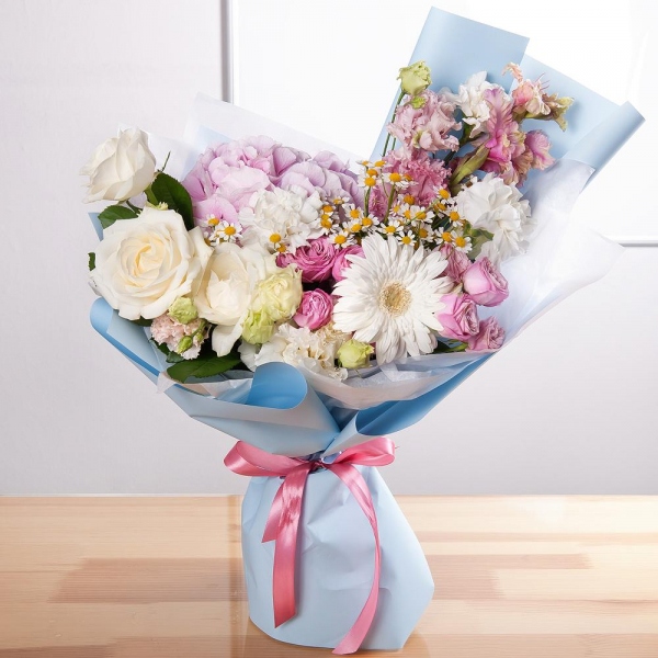 Gerbera white - 1, Pink Hydrangea - 1, Carnation white, cream - 5, Chamomile - 2, Peony sprayrose - 2, White rose 50 cm - 4, Pink Gladiolus - 2, lisianthus - 1, Pink Lisianthus (Eustoma) - 1, Wrapping Paper