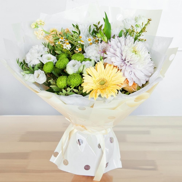 Chamomile - 1, Baltica White Spray Chrysanthemum - 2, Athos pom Feeling Green - 2, Alstromeria white, soft pink - 3, lisianthus - 2, Spray rose: white, cream, light pink 50 cm - 2, White Matthiola - 2, Carnation white, cream - 4, Magnum Purple Chrysanthemum - 1, Gerbera yellow - 1, Solidago (1 pc.), Pistachio, Wrapping Paper