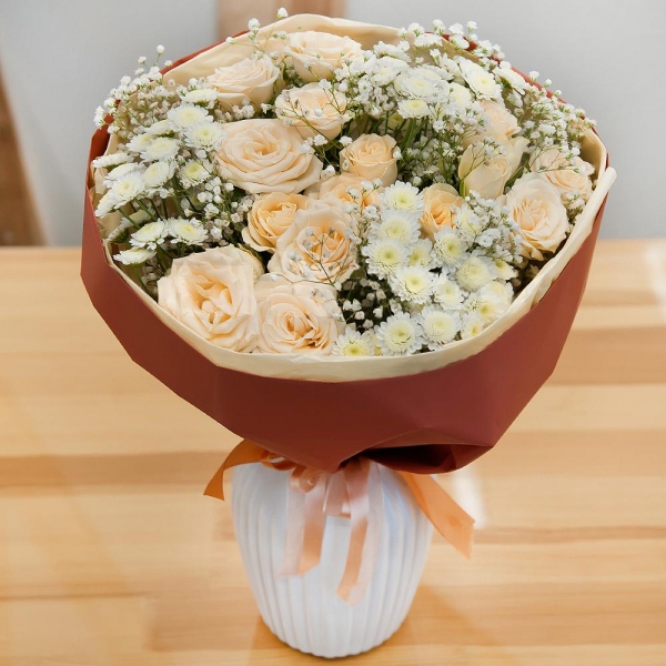 Spray rose: white, cream, light pink 50 cm - 8, Athos poms Stallion - 5, Gypsophila - 2, Wrapping Paper