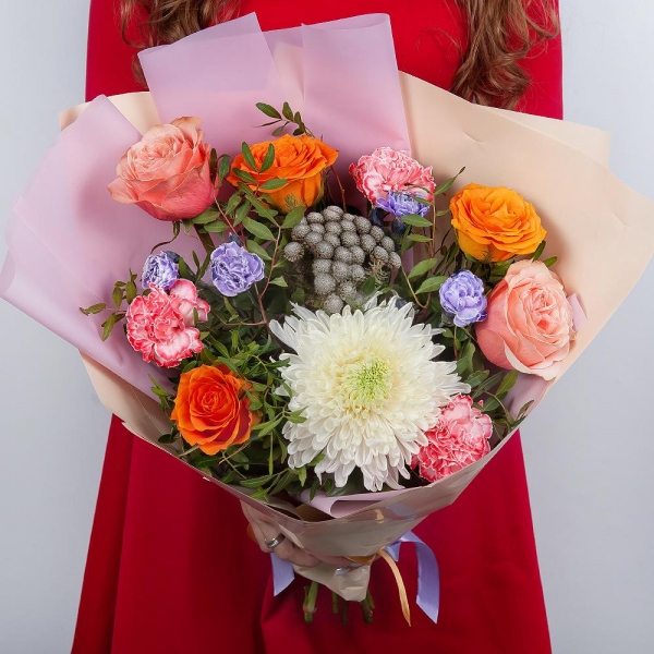 Magnum White Chrysanthemum - 1, Orange carnation - 5, Pink spray carnation - 3, Peony rose Kahala 50 cm - 3, Multicolor rose 50 cm - 4, Brunia Green Lanuginosa (1 pc.), Pistachio, Wrapping Paper, Ribbon
