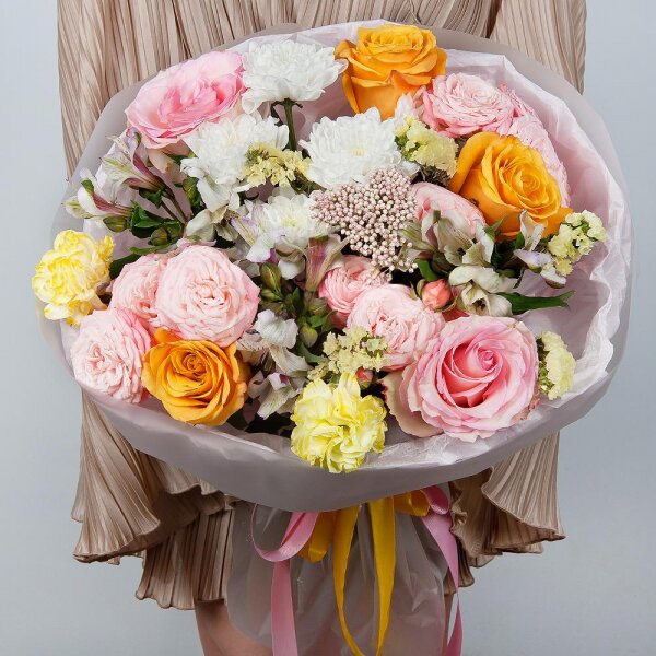 Yellow rose 50 cm - 3, Pink rose 50 cm - 2, Baltica White Spray Chrysanthemum - 1, Peony sprayrose - 3, Alstromeria white, soft pink - 3, Yellow carnation - 2, Yellow Statice, Ozotamnus, Wrapping Paper