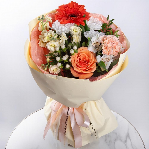 Gerbera daisies - 1, Baltica White Spray Chrysanthemum - 1, White Matthiola - 1, Alstromeria white, soft pink - 3, Pink carnation - 2, Rose Cream 50 cm - 1, Hypericum, Pistachio, Wrapping Paper